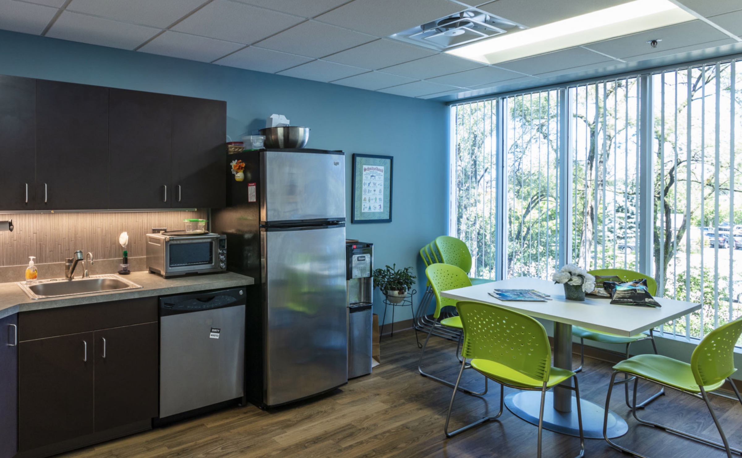 Tenant break room with floor-to-ceiling windows